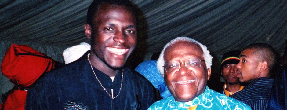 Patrick Kabanda with Archbishop Desmond Tutu