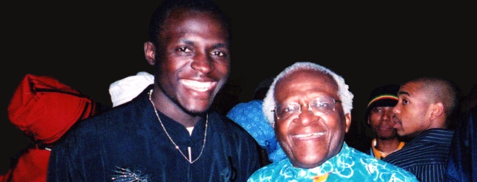 Patrick Kabanda with Archbishop Desmond Tutu